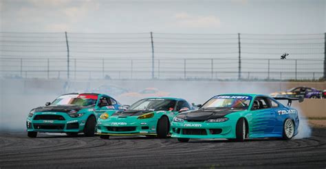 Drift Cars on a Track · Free Stock Photo