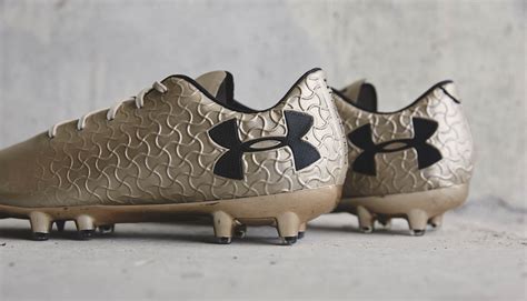 Under Armour Magnetico Pro "Metallic Gold" - SoccerBible