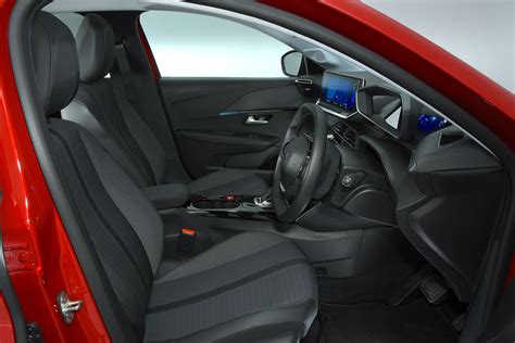 Peugeot e-208 interior | Autocar