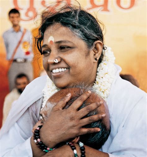 About Amma - Embracing The World