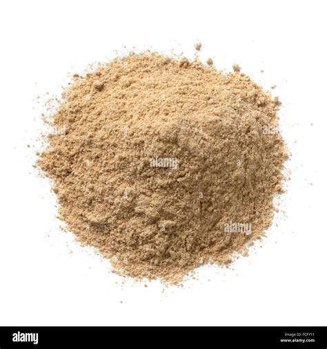 Heap of ground kencur powder on white background Stock Photo - Alamy