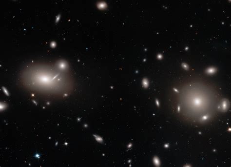 This incredible Hubble snapshot of a galaxy cluster took an incredible ...