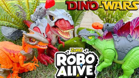 Zuru Robo Alive Dino Wars! Walking and Biting T-Rex, Stegosaurus and Velociraptor! Light Up Dino ...