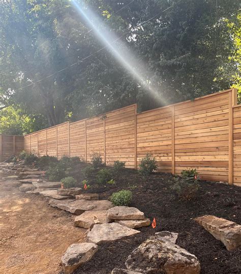 WOOD PRIVACY FENCE — landscape earth fence