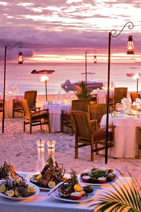 Drink in a Mauritian sunset at Jacaranda, a chic seafood restaurant directly on the beach ...