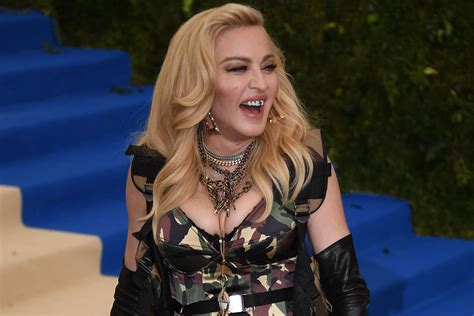 Madonna explains her grills: 'I have really ugly teeth'