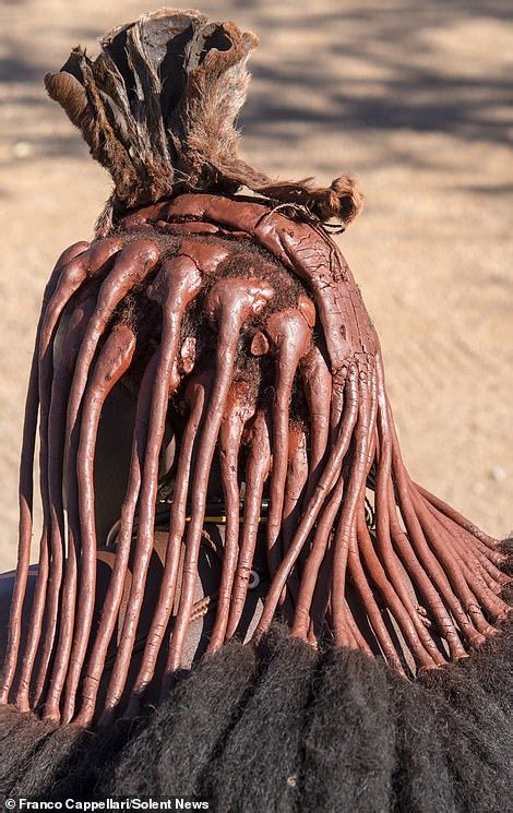 Namibia's isolated Himba tribe use bright clay to create incredible hairstyles and make up ...