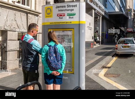 Tourists looking at a map of Liverpool at James Street Station, Liverpool, Merseyside, UK Stock ...