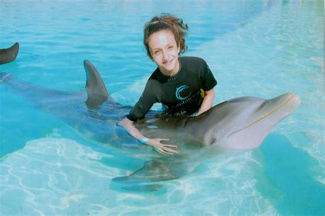 Swimming with dolphins on Paradise Island, Bahamas Dolphin Hotel ...