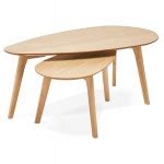Large-format oval black wooden tables.
