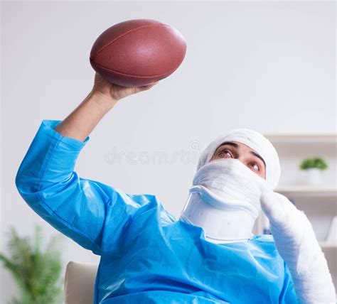 The Injured American Football Player Recovering in Hospital Stock Photo ...