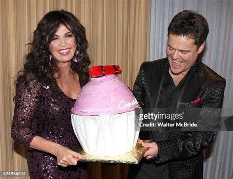 Donny Osmond & Marie Osmond with Donny's Birthday Cake, attending the ...