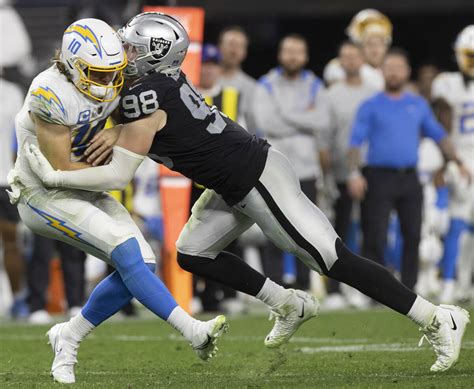 Raiders defensive end Maxx Crosby (98) sacks Los Angeles Chargers ...