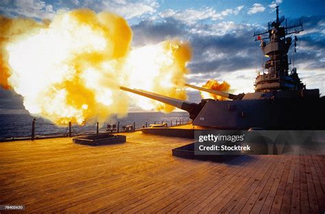 Battleship Firing Guns High-Res Stock Photo - Getty Images