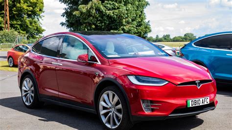 I love electric cars, but here are my five reasons not to buy a Tesla ...