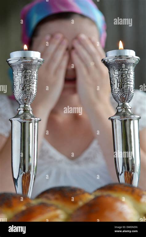 Jewish Sabbath Lighting Candles High Resolution Stock Photography and ...