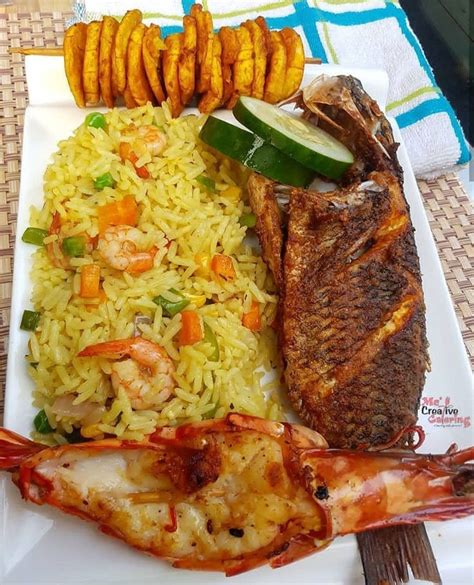 Fried rice, vegetables, fried fish, fried plantain and shrimp. Cucumber | African recipes ...