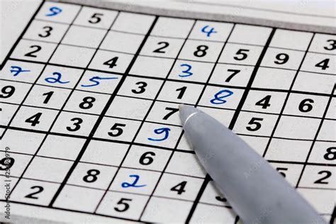 Sudoku with pen Stock Photo | Adobe Stock