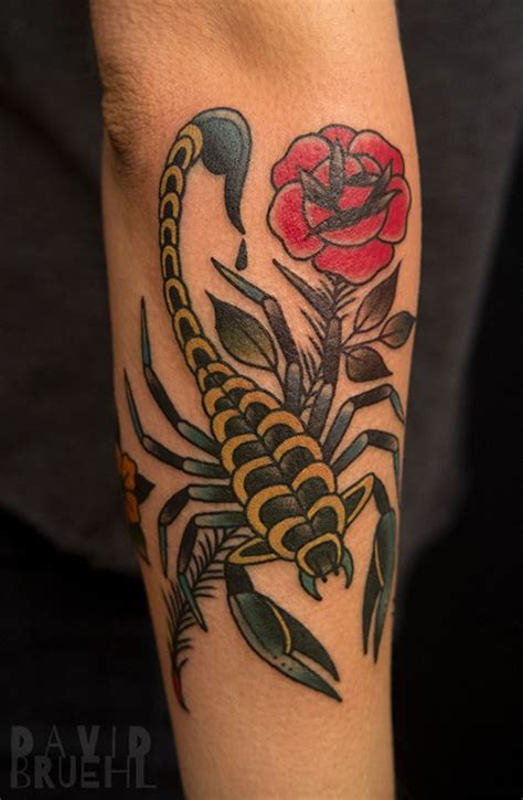 Traditional tattoo of a scorpion and rose on an arm. By David Bruehl at ...