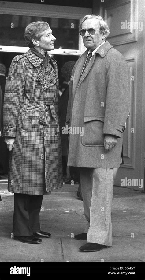 Actor Kenneth Williams (left) and Hattie Jacques' former husband John Le Mesurier outside St ...