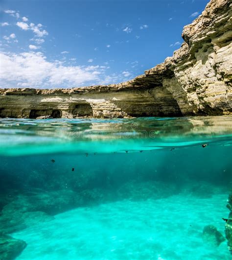 View of the Cliffs and Sea Caves of Cape Greco from Under the Wa Stock Photo - Image of beauty ...