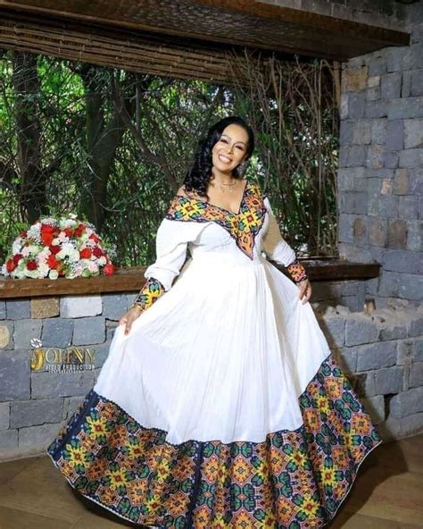 Flower tilet Habesha kemis | Ethiopian traditional dress, Traditional ...