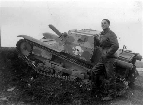 Hungarian officer poses next to an Italian-made CV35 Аnsaldo tanket of the roughly 300 bought by ...