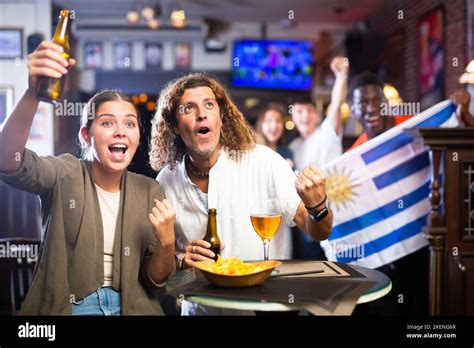 Uruguay football team fans spending time in bar Stock Photo - Alamy