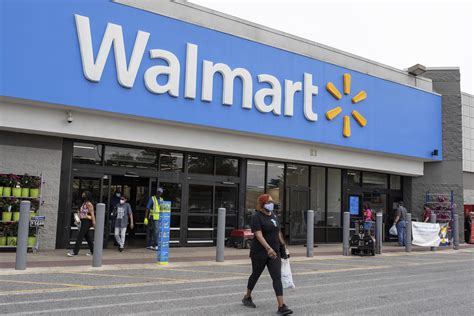 Walmart sales soared, essential workers got scant protection | AP News