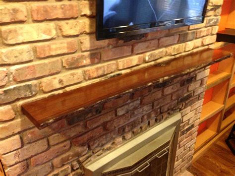 Hand Crafted Live Edge Slab Fireplace Mantel by MAD Woodwork | CustomMade.com