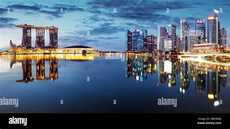 Singapore city skyline at night Stock Photo - Alamy