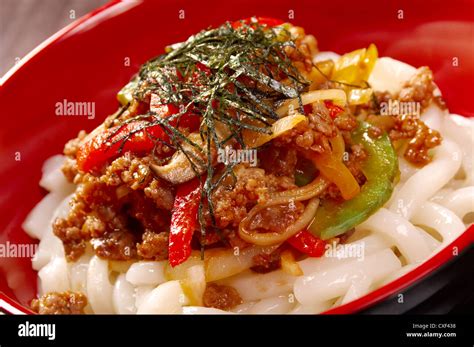 udon noodles with beef tendon stew Stock Photo - Alamy