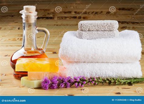 Essential Oil, Bars of Soap, Towels and Flowers - Stock Photo - Image of medicine, scented ...