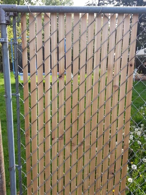 Cedar fence slats for chain link fence