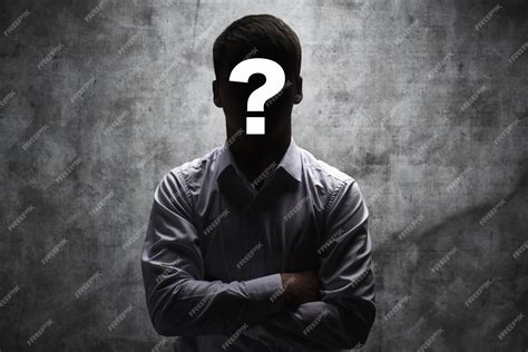 Premium Photo | Anonymous man in a business shirt with question mark on ...