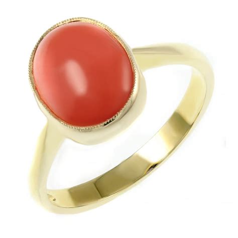 9ct yellow gold 12mm x 10mm oval coral ring - Jewellery from Mr Harold ...