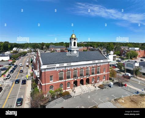 Needham Town Hall aerial view at 1471 Highland Avenue in historic town center of Needham ...