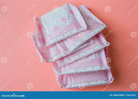 Menstruation, Wrapped Pink Period Pads Against Pink Background Stock Photo - Image of background ...