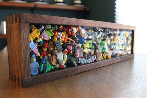 I needed a fun way to display my LEGO minifigure collection so I made ...