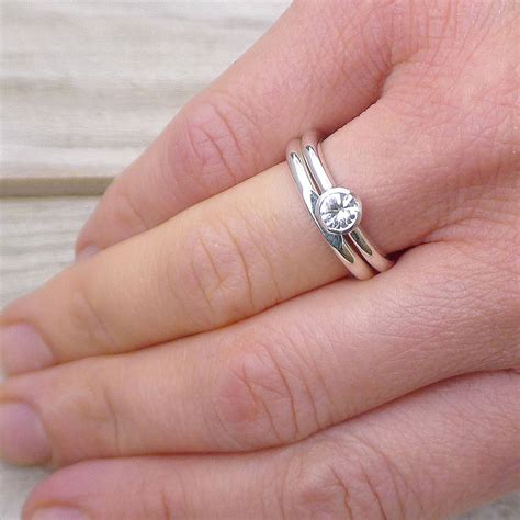 white sapphire engagement ring set by lilia nash jewellery | notonthehighstreet.com