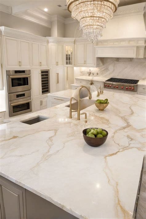 Taj Mahal quartzite countertops and White Dove cabinets: A perfect ...