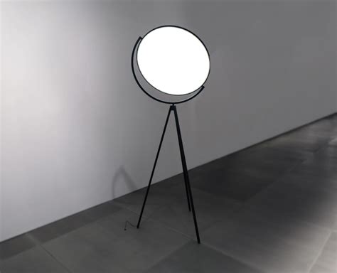 jasper morrison's flat disc superloon lamp for flos is reminiscent of the moon
