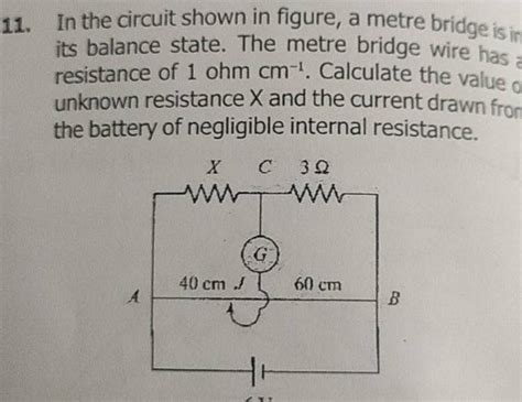 11. In the circuit shown in figure, a metre bridge is in its balance stat..