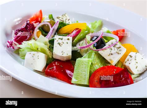 Traditional Greek salad with spices Stock Photo - Alamy