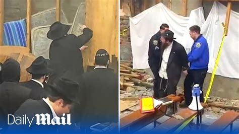 Hasidic jews find secret tunnel at New York synagogue and brawl with police as they try to close ...