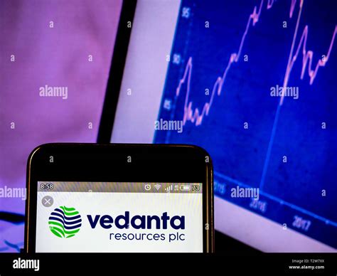 In this photo illustration a Vedanta Resources logo seen displayed on a ...