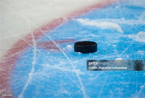 Closeup Of Hockey Puck In Ice Rink High-Res Stock Photo - Getty Images