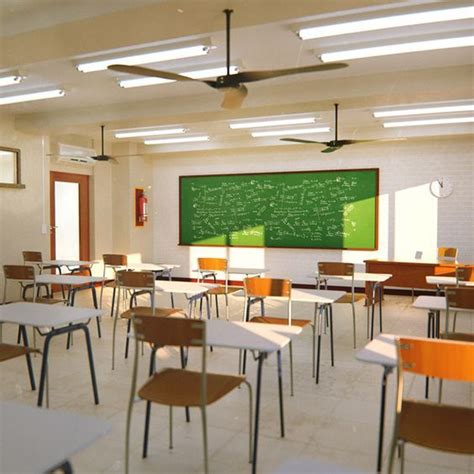 an empty classroom with desks and chairs