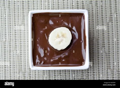 banana slice in chocolate syrup Stock Photo - Alamy