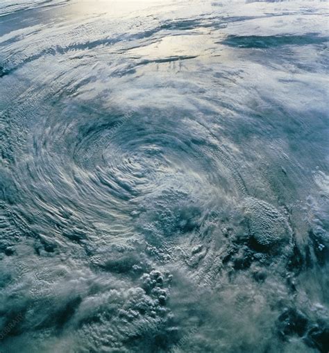 Tropical Storm Iniki seen from space, STS-47 - Stock Image - E140/0063 - Science Photo Library